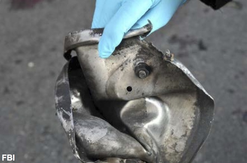 This image from a Federal Bureau of Investigation and Department of Homeland Security joint bulletin issued to law enforcement and obtained by The Associated Press, shows the remains of a pressure cooker that the FBI says was part of one of the bombs that exploded during the Boston Marathon. The FBI says it has evidence that indicates one of the bombs was contained in a pressure cooker with nails and ball bearings, and it was hidden in a backpack. (AP Photo/FBI)