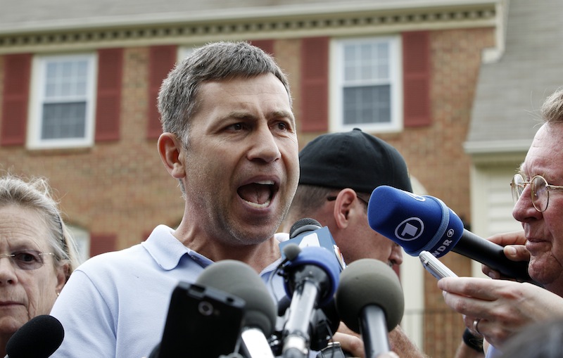 In this April 19, 2013, file photo, Ruslan Tsarni, the uncle of the Boston Marathon bombing suspect, speaks with the media outside his home in Montgomery Village in Md. In the years before the Boston Marathon bombings, Tamerlan Tsarnaev fell under the influence of a new friend, a Muslim convert who steered the religiously apathetic young man toward a strict strain of Islam, family members said. "Somehow, he just took his brain," said Tsarni, who recalled conversations with Tamerlan's worried father about the friend of Tamerlan's known only to the family as Misha. (AP Photo/Jose Luis Magana, File)