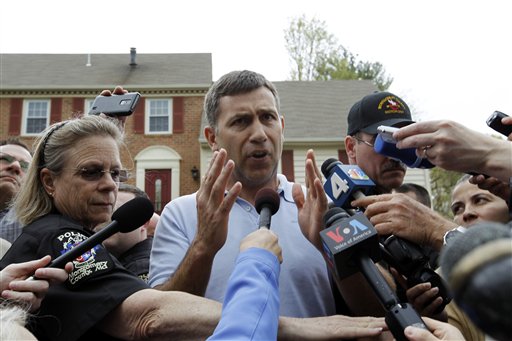 Ruslan Tsarni, the uncle of the Boston Marathon bombing suspect, speaks with the media outside his home in Montgomery Village in Md. on Friday.