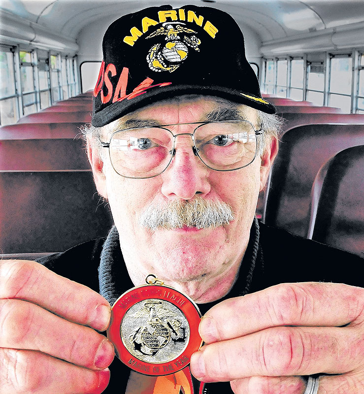 Richard Gordon of Norridgewock holds the medal he received for being named Maine Marine Corps League Marine of the Year.