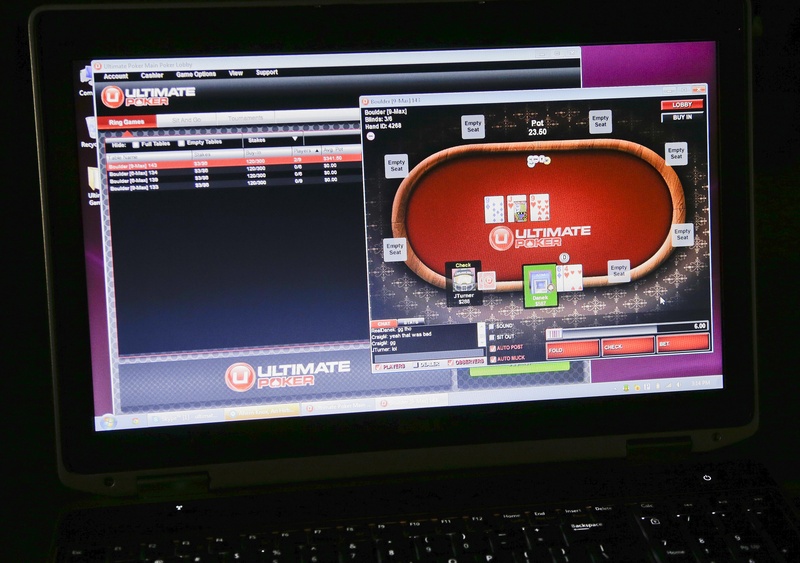 A sample poker game is played on the Ultimate Gaming website that launched Tuesday in Las Vegas.