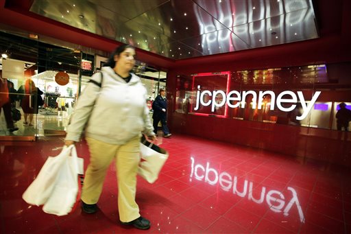 A customer leaves a J.C. Penney store Tuesday in New York City. The J.C. Penney board is hoping a former CEO can revive the retailer after a risky turnaround strategy by ousted CEO Ron Johnson backfired and sales plunged.