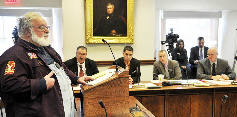 Donald Loncto, of Fletchers Landing Township, testifies against legislation to restrict the size of ammunition clips Monday at the State House in Augusta.