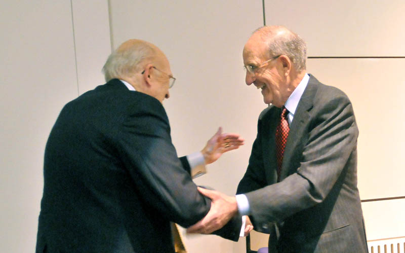 Sen. George J. Mitchell, right, introduces former U.S. Senator Alan K. Simpson to deliver the 2013 George J. Mitchell Distinguished International Lecture at Ostrove Auditorium at Colby College Wednesday.