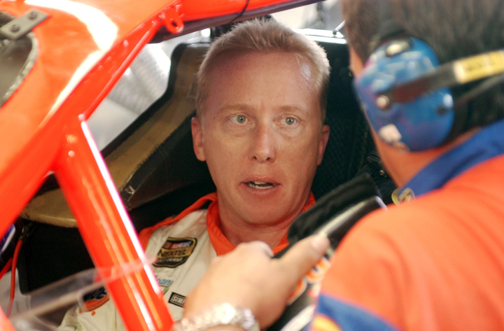 In this 2004 photo, NASCAR driver Ricky Craven talks before practice for the Nextel Cup Siemens 300 at New Hampshire International Speedway in Loudon, N.H.
