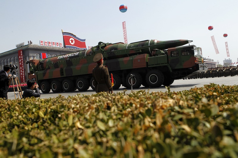 In this Sunday, April 15, 2012 file photo, a North Korean vehicle carrying what appears to be a new missile passes by during a mass military parade in Pyongyang's Kim Il Sung Square to celebrate the centenary of the birth of the late North Korean founder Kim Il Sung. U.S. defenses could intercept a ballistic missile launched by North Korea if it decides to strike, the top American military commander in the Pacific said Tuesday. (AP Photo/Ng Han Guan, File)