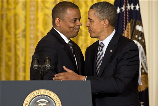 President Barack Obama embraces Charlotte, N.C., Mayor Anthony Foxx at the White House on Monday. The president announced he would nominate Foxx to succeed Ray LaHood as transportation secretary.