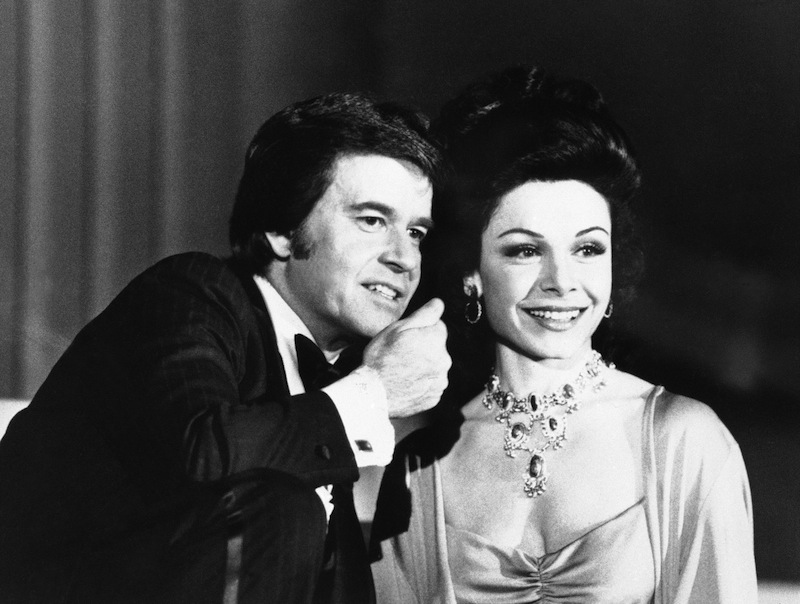 In this January 1978 file photo, executive producer Dick Clark welcomes former "Mouseketeer" Annette Funicello to the party when ABC-TV presents "ABC's Silver Anniversary Celebration," a gala four-hour telecast. Walt Disney Co. says, Monday, April 8, 2013, that Funicello, also known for her beach movies with Frankie Avalon, has died at age 70. (AP Photo/File)