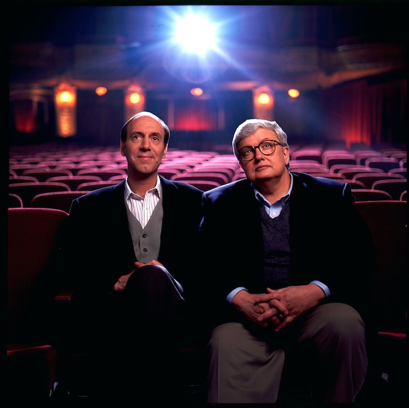 This undated file photo originally released by Disney-ABC Domestic Television, shows movie critics Roger Ebert, right, and Gene Siskel. Ebert died on Thursday, April 4, 2013. He was 70. Ebert and Siskel, who died in 1999, trademarked the "two thumbs up" phrase. (AP Photo/Disney-ABC Domestic Television)