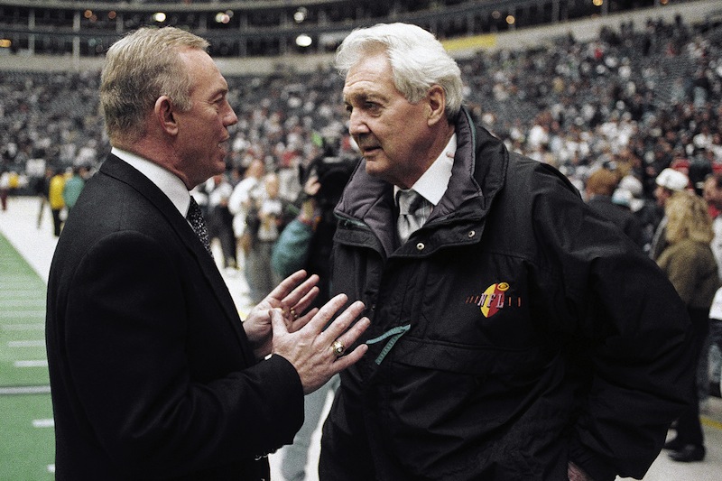 In this Jan. 23, 1994, file photo, Dallas Cowboys owner Jerry Jones, left, talks with CBS commentator Pat Summerall before the NFL football NFC championship game between the Cowboys and the San Francisco 49ers in Irving, Texas. Fox Sports spokesman Dan Bell said Tuesday, April 16, 2013, that Summerall, the NFL player-turned-broadcaster whose deep, resonant voice called games for more than 40 years, has died at the age of 82. (AP Photo/Ron Heflin, File)