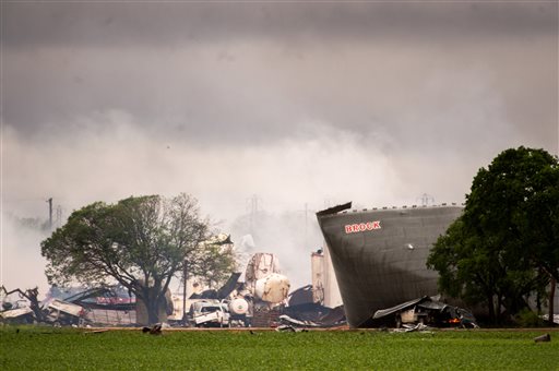 The remains of the the West Fertilizer Co. plant smolder in the rain on on Thursday in West, Texas.
