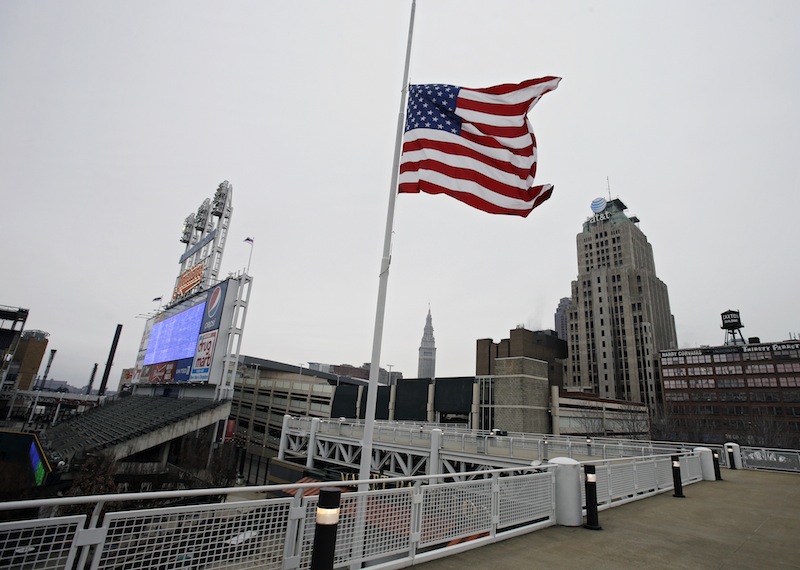 A United States flag flies at half mast for the victims of the Monday bombing at the Boston Marathon, on Tuesday, April 16, 2013, at Progressive Field in Cleveland before a baseball game between the Boston Red Sox and Cleveland Indians. (AP Photo/Mark Duncan) Progressive Field