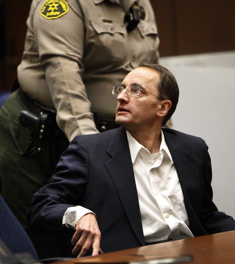 Christian Gerhartsreiter is led away by a Sheriff's deputy in a Los Angeles Superior Courtroom after a jury delivered a guilty verdict on April 10, 2013 in Los Angeles. The jury found Gerhartsreiter guilty in the death of a California man nearly three decades ago. The verdict was reached Wednesday after the jury deliberated about a day. Testimony in the cold-case trial of Gerhartsreiter focused on the discovery of the bones of John Sohus long after he and his wife disappeared from his mother’s home in San Marino, a wealthy Los Angeles suburb. The defendant, a German immigrant with delusions of grandeur, rented a cottage at the Sohus home in 1985 then disappeared about the same time as Sohus and his wife Linda who was never found. (AP Photo/Los Angeles Times, Al Seib)
