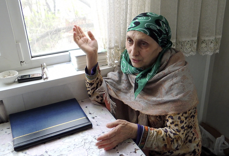 In this image taken from a video, Patimat Suleimanova, the aunt of the Boston Marathon bombing suspects, speaks in her home in the Russian city of Makhachkala about her nephew, Tamerlan Tsarnaev, on Monday.