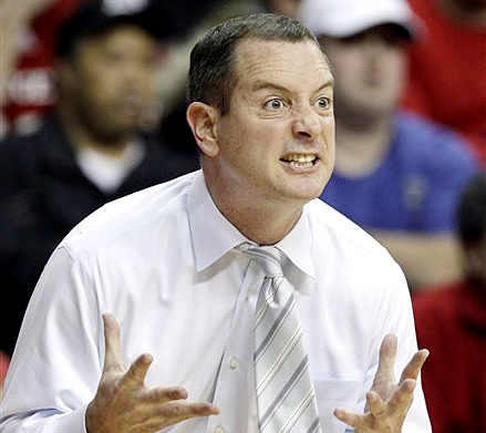 Rutgers coach Mike Rice reacts to play during a game against Connecticut in Piscataway, N.J., in this 2012 photo. The airing of a videotape of Rice using gay slurs, shoving and grabbing his players and throwing balls at them in practice led to his firing on Wednesday.