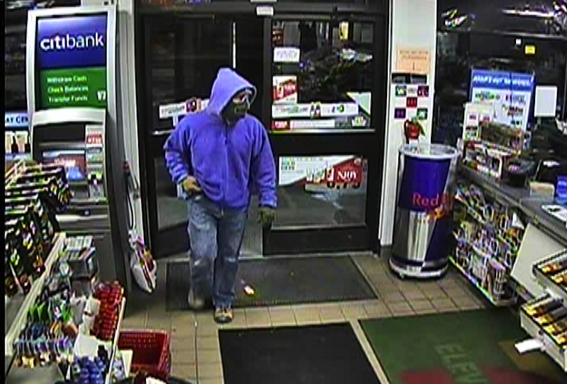 This surveillance-camera image shows a suspect robbing the 7-Eleven in Springvale on the night of Feb. 5.