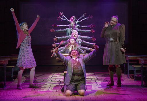 The cast of "Matilda The Musical," including Bertie Carvel, right, and Lauren Ward, left, performs in New York.