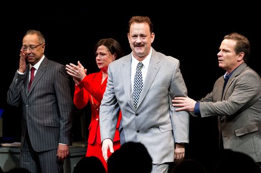 George C. Wolfe, left, Maura Tierney, Tom Hanks and Peter Scolari perform in "Lucky Guy " in New York. Hanks received a Tony nomination for best leading actor for his role in the play.