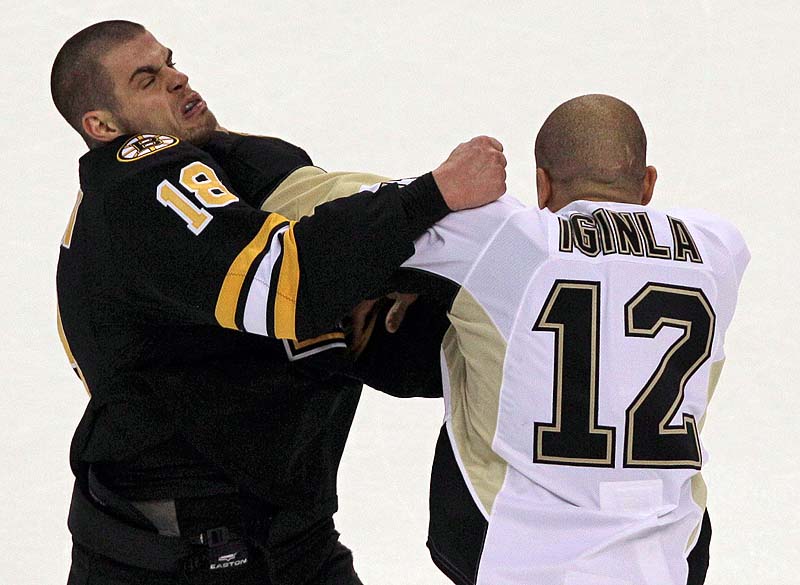 Nathan Horton of the Bruins and Pittsburgh's Jarome Iginla fight during Saturday's game at TD Garden. The Penguins won, 3-2.