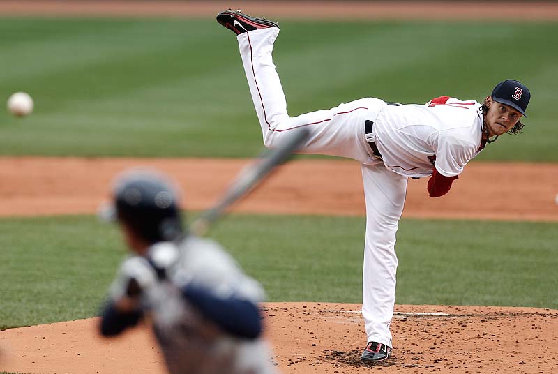 Clay Buchholz throws a pitch against the Tampa Bay Rays Sunday at Fenway Park.