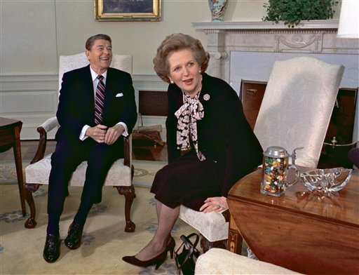 In this Feb. 20, 1985, photo, former British Prime Minister Margaret Thatcher meets with her friend and political ally President Ronald Reagan during a visit to the White House in Washington.