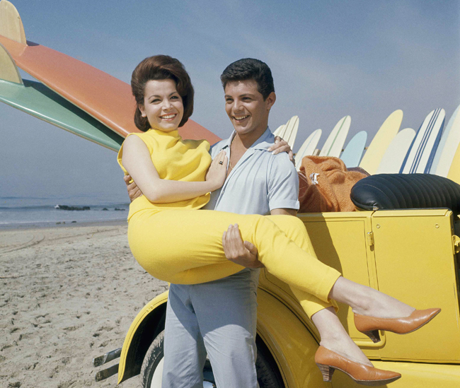 Actress Annette Funicello with singer Frankie Avalon on Malibu Beach, Calif., during the 1963 filming of "Beauty Party."