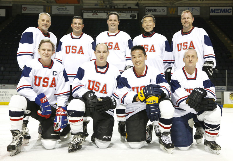 Takahiro Sato, owner of Yosaku restaurant, has arranged for his Maine men’s league hockey team to go to Japan to play former Japanese Olympians to raise money for young victims of the 2011 earthquake and tsunami. Team members include, left to right in back row, Mark Hews, Joe Ouellette, Jeff Milburn, Takahiro Sato and James Witham, and in front row, John Whitman, Brian Marcaurelle, Steve Tsujiura, who played for the Maine Mariners, and Thomas Hall.