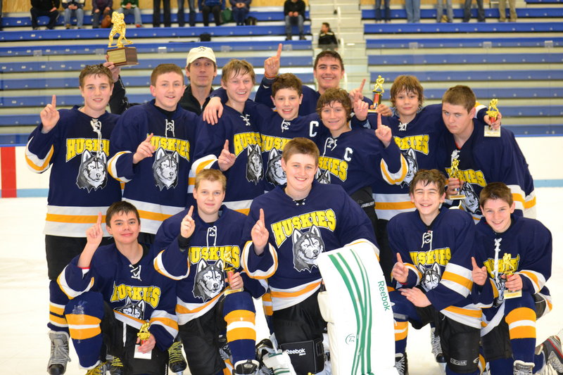 Members of the Huskies Blues bantam hockey team, which recently won the Casco Bay Hockey Tournament in Biddeford: Front (from left to right) – Elijah Gosselin, Darren Puckett, Kyle McKay, Doug Brooks and Jacob Picard; middle – Devin Sloan, Anthony Morrison, Sam Jacob, Tom Komulainen, Gage Chenard, Dylan Francoeur and David Redmond; back – Coach Jake Jacob and Chris Lekousi.