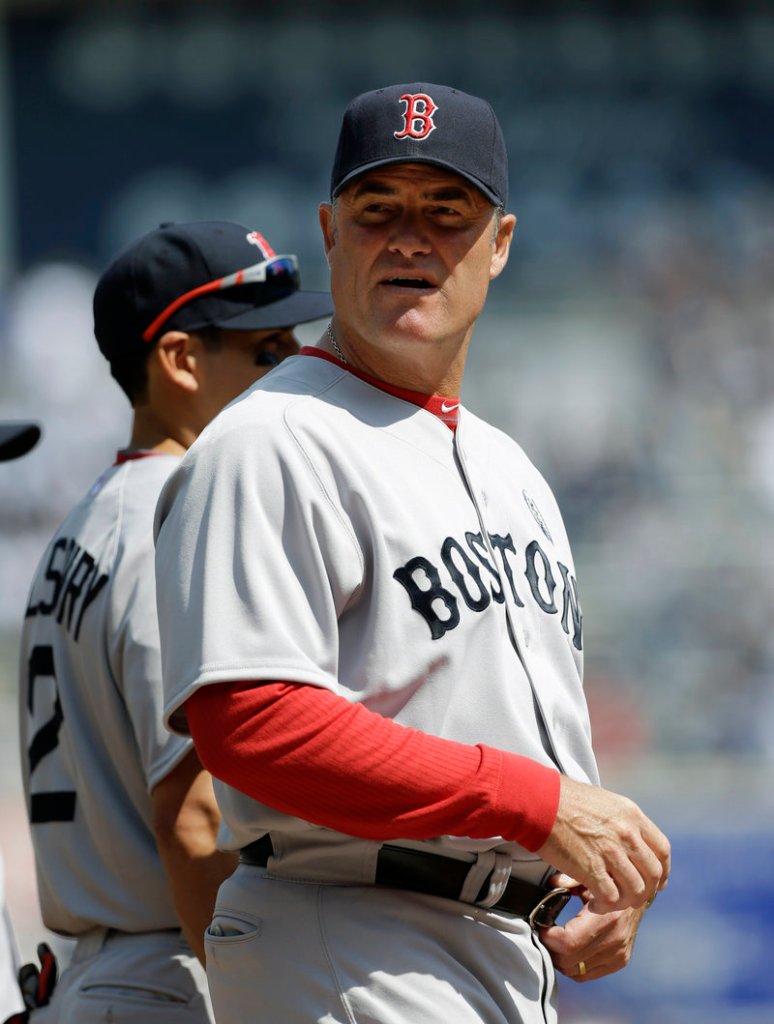 Boston Manager John Farrell scans the crowd at Yankee Stadium before the team’s Opening Day game Monday.