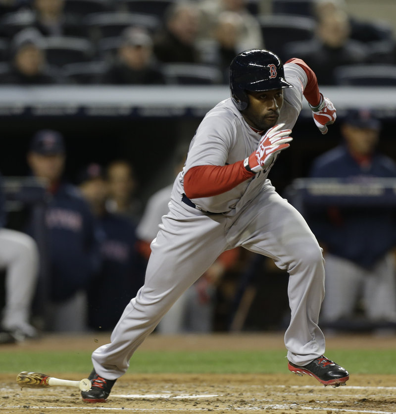 Jackie Bradley Jr. sprints to first base Wednesday night after driving the ball up the middle in the third inning, driving in a run with his first major league hit as the Boston Red Sox beat the New York Yankees.