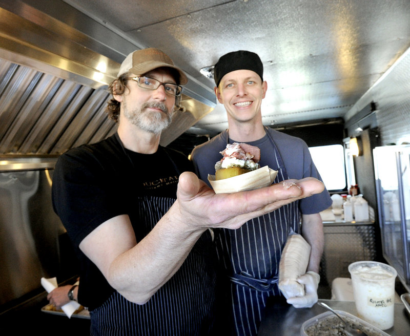 Chefs Rob Evans and Karl Deuben display an appetizer of panelle with fennel, goat ricotta and Duckfat coppa that they prepared in the truck for Good Shepherd’s recent annual gala.