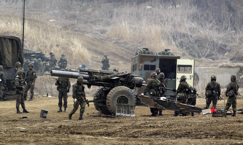 South Korean Army K-55 self-propelled howitzers are deployed during their military exercise in the border city between two Koreas, Paju, north of Seoul, South Korea on Friday. After a series of escalating threats, North Korea has moved a missile with "considerable range" to its east coast, South Korean Defense Minister Kim Kwan-jin said Thursday. But he emphasized that the missile was not capable of reaching the United States and that there are no signs that the North is preparing for a full-scale conflict.