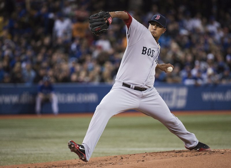 Boston Red Sox starting pitcher Felix Doubront works against the Toronto Blue Jays in the first inning in Toronto on Friday.