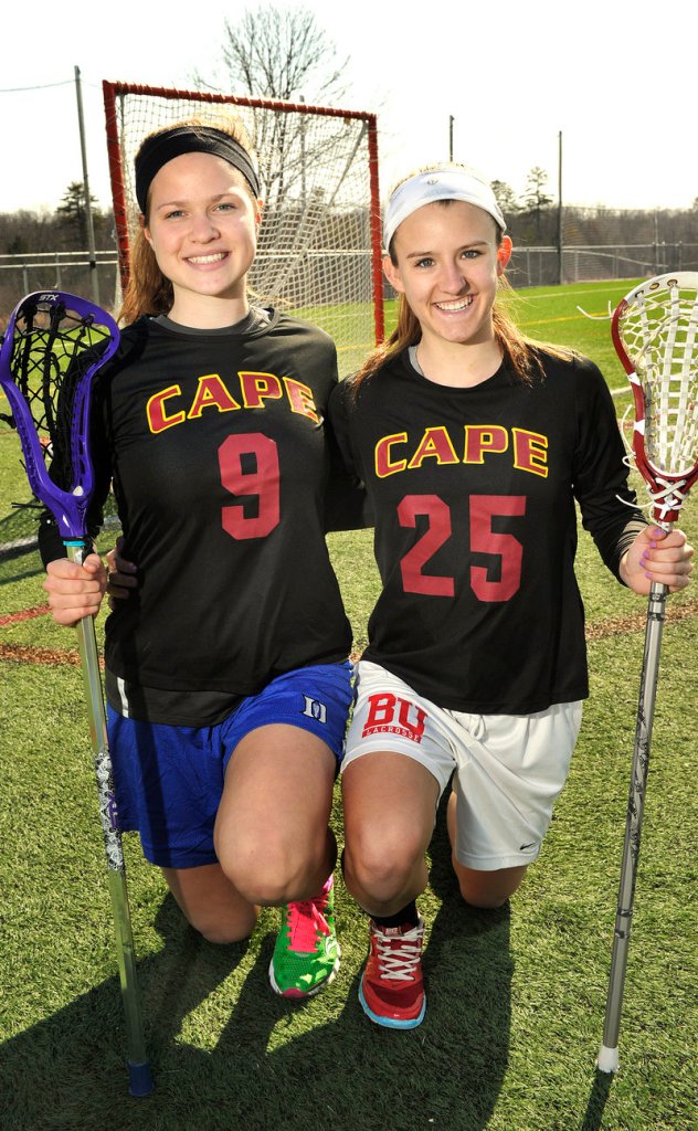 Cape Elizabeth girls’ lacrosse players Lauren Steidl, left, and Talley Perkins are both headed for Division I college programs, as Perkins will attend Boston University and Steidl will be at Princeton next year.