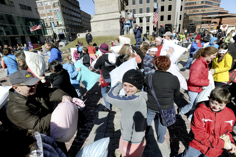 The pillow fight rages Saturday in Monument Square.