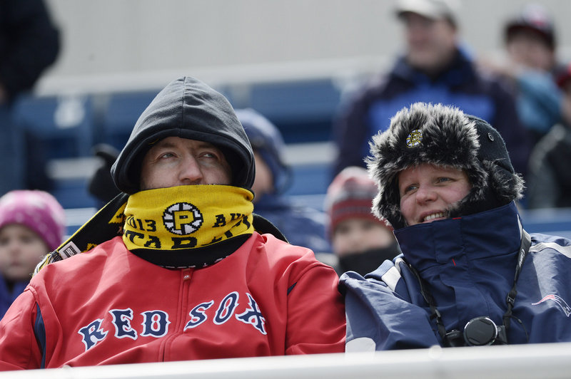 Hats, scarves and warm jackets were wisely donned by David and Vicki Grimbley of Methuen, Mass., as they braved the weather to see the Sea Dogs.