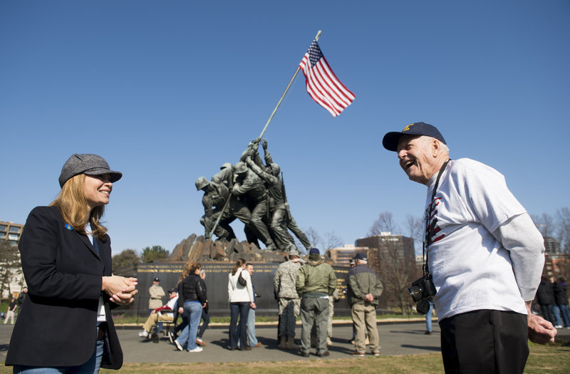 Maine state Rep. Lisa Villa, D-Harrison, talks Sunday with World War II veteran Bill Quackenbush, of Litchfield, at the Iwo Jima Memorial in Arlington, Va. Quackenbush served as a gunner’s mate on a transport used by the Navy in the Normandy invasion.