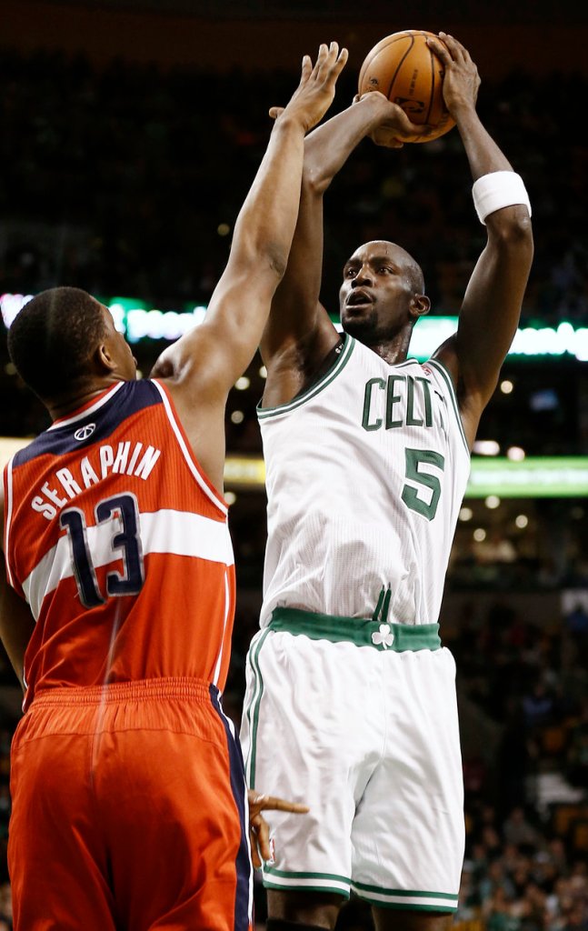 Boston’s Kevin Garnett scored 12 points in a 107-96 win over the Wizards at Boston on Sunday. It was Garnett’s first night back after missing eight games with an inflamed ankle.
