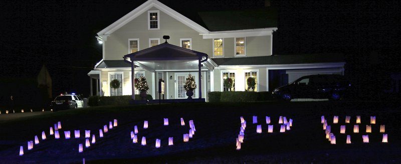 The word "hope" is illuminated outside a Woodbury, Conn., funeral home hosting the wake of Sandy Hook Elementary Principal Dawn Hochsprung last Dec. 19. In the same spirit of unity that prevailed after six adults and 20 children were shot to death at Sandy Hook, senators should reject filibuster efforts and pass a reasonable and moderate package of gun control reforms.