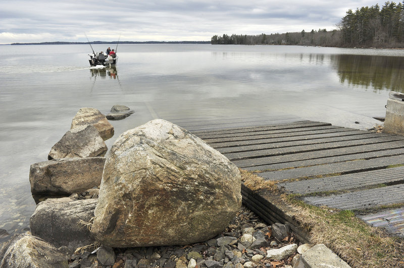 It still being early in the season, a boat heads onto Sebago Lake via a public launch that soon may have a long wait due to a lack of such facilities, especially on lakes and ponds in York and Cumberland counties.