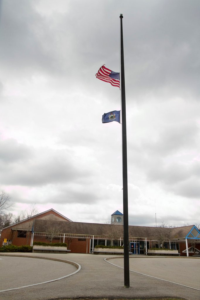Flags fly at half-staff Thursday outside Berwick’s Vivian E. Hussey Primary School, where Amy Harris taught special education.