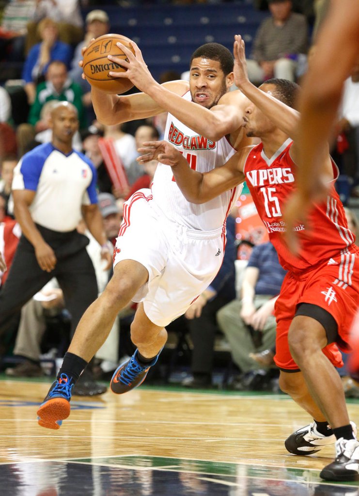 Mark Tyndale of the Maine Red Claws drives past Andrew Goudelock of the Rio Grande Valley Vipers during the second quarter of Rio Grande Valley’s 120-118 victory.