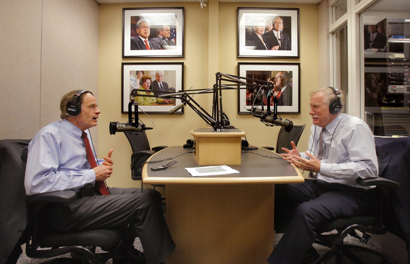 Joined by Sen. Tom Carper, D-Del., left, Sen. Angus King participates Thursday in a weekly radio program sponsored by WGAN radio. It was one of several media events that followed the Maine senator’s already lengthy workday on the Senate floor.