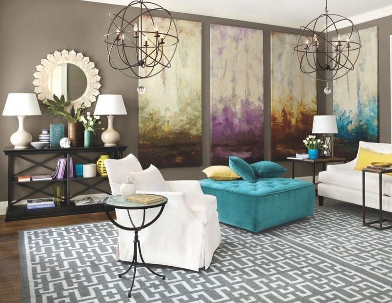 This image from the Ballard Designs catalog shows a living space boasting an eye-catching decor. With the housing recovery gaining momentum, Americans have more incentives to redecorate their homes. But there’s no need to spend a lot doing it.