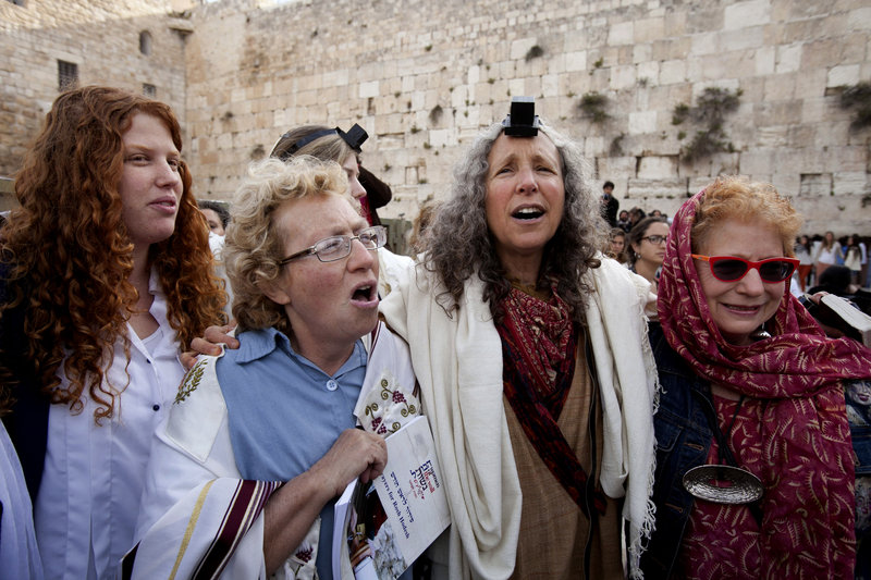Israeli women pray Thursday at the Western Wall in Jerusalem, the holiest site where Jews can pray. Orthodox rabbis oppose mixed-gender prayers.