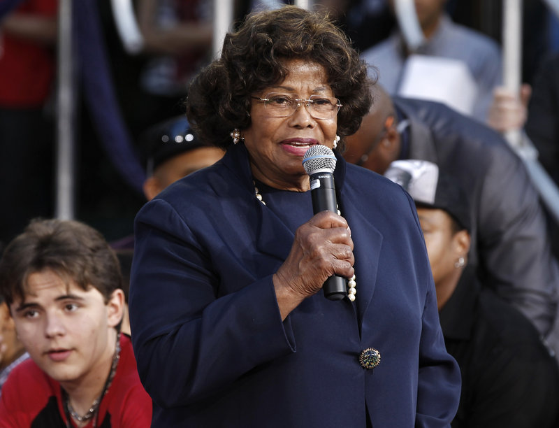 Katherine Jackson is shown at a 2012 ceremony honoring her son, Michael Jackson. His son, Prince Michael Jackson, is at left. Jury selection began Monday in a civil trial against concert giant AEG Live.