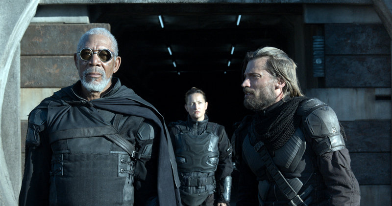 Morgan Freeman, left, Andrea Riseborough and Nikolaj Coster-Waldau in the post-apocalyptic world of “Oblivion.”