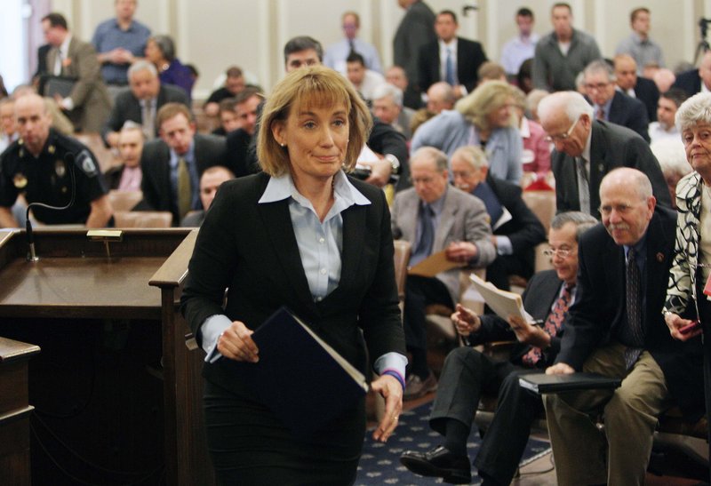 Gov. Maggie Hassan, D-N.H., leaves a joint House panel public hearing Tuesday, April 16, 2013 at the Statehouse in Concord, N.H., after urging them to pass a bill to license a single casino in New Hampshire. Hassan urged the House on Tuesday not to let Massachusetts benefit from casino revenues that could help New Hampshire pay for vital services without raising taxes. (AP Photo/Jim Cole)