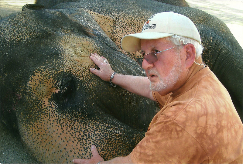 Dr. Rod Block works with an elephant in 2012 at an animal sanctuary in Perris, Calif. “You have to be very much in tune with the being of the animal,” he says.
