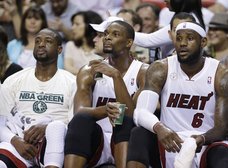 They will, they will scorch you ... from left, Miami Heat guard Dwayne Wade, forward Chris Bosh and forward LeBron James are set to simmer against the Milwaukee Bucks when the NBA playoffs tip off this weekend.